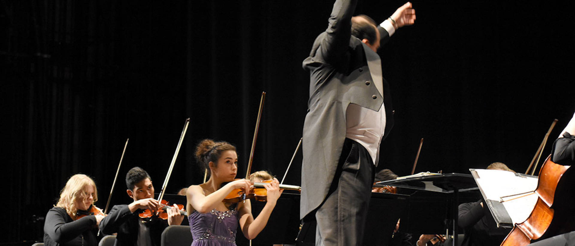 Anne Schreiber, violin, and student conductor Carlos Rojo