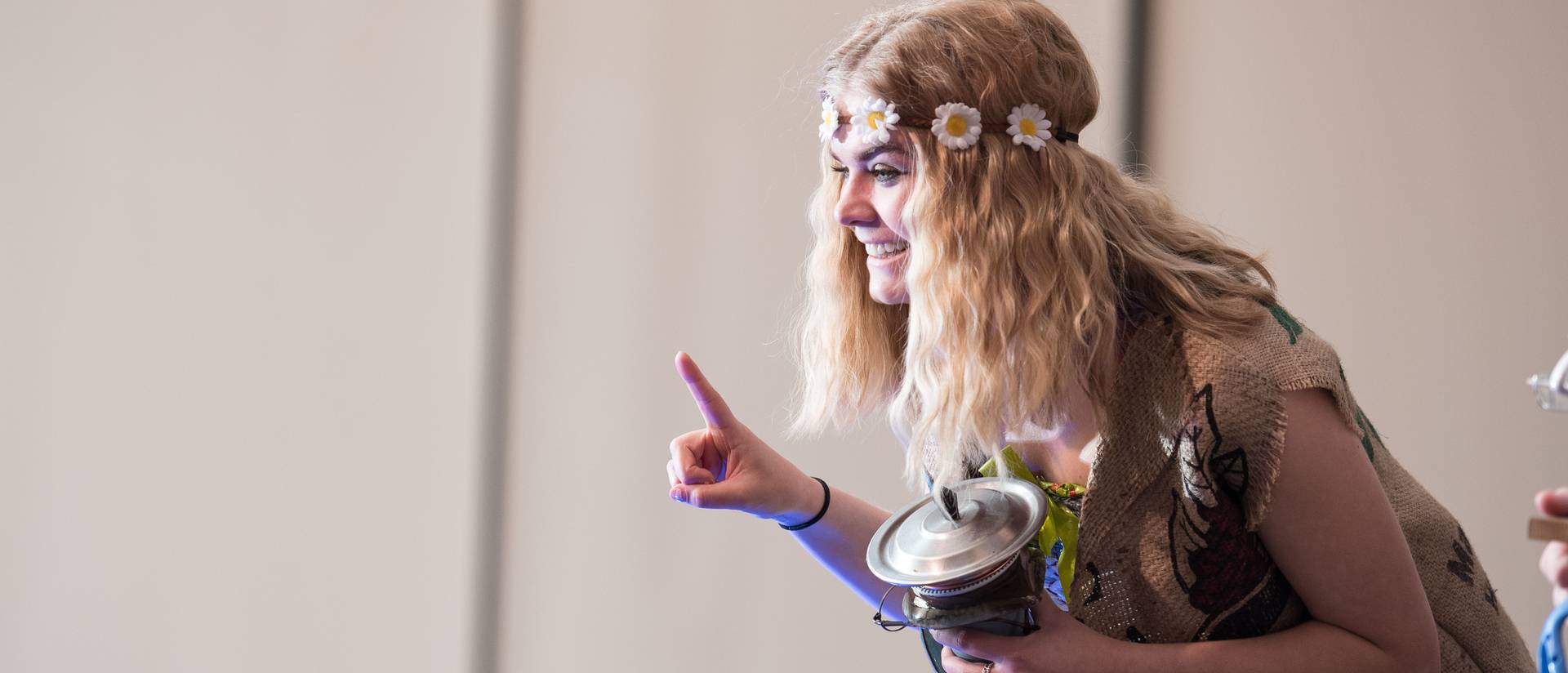 A student wears an outfit made from recycled materials for the Just Bag It Fashion Show.
