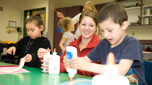 A group of UWEC students visit the Lac Courte Oreilles school system in Hayward Wisaconsin