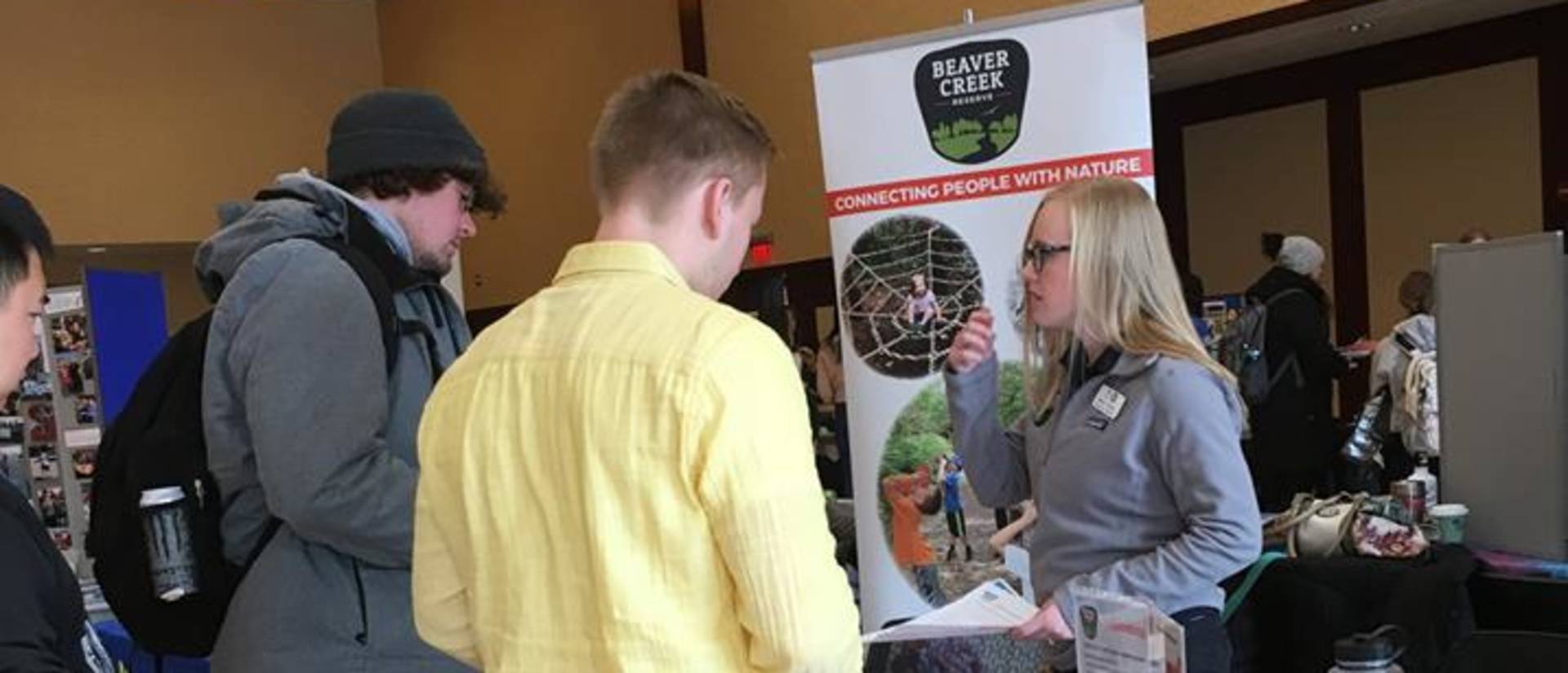 Students talk to organizations about volunteering opportunities at the service-learning and community engagement fair.